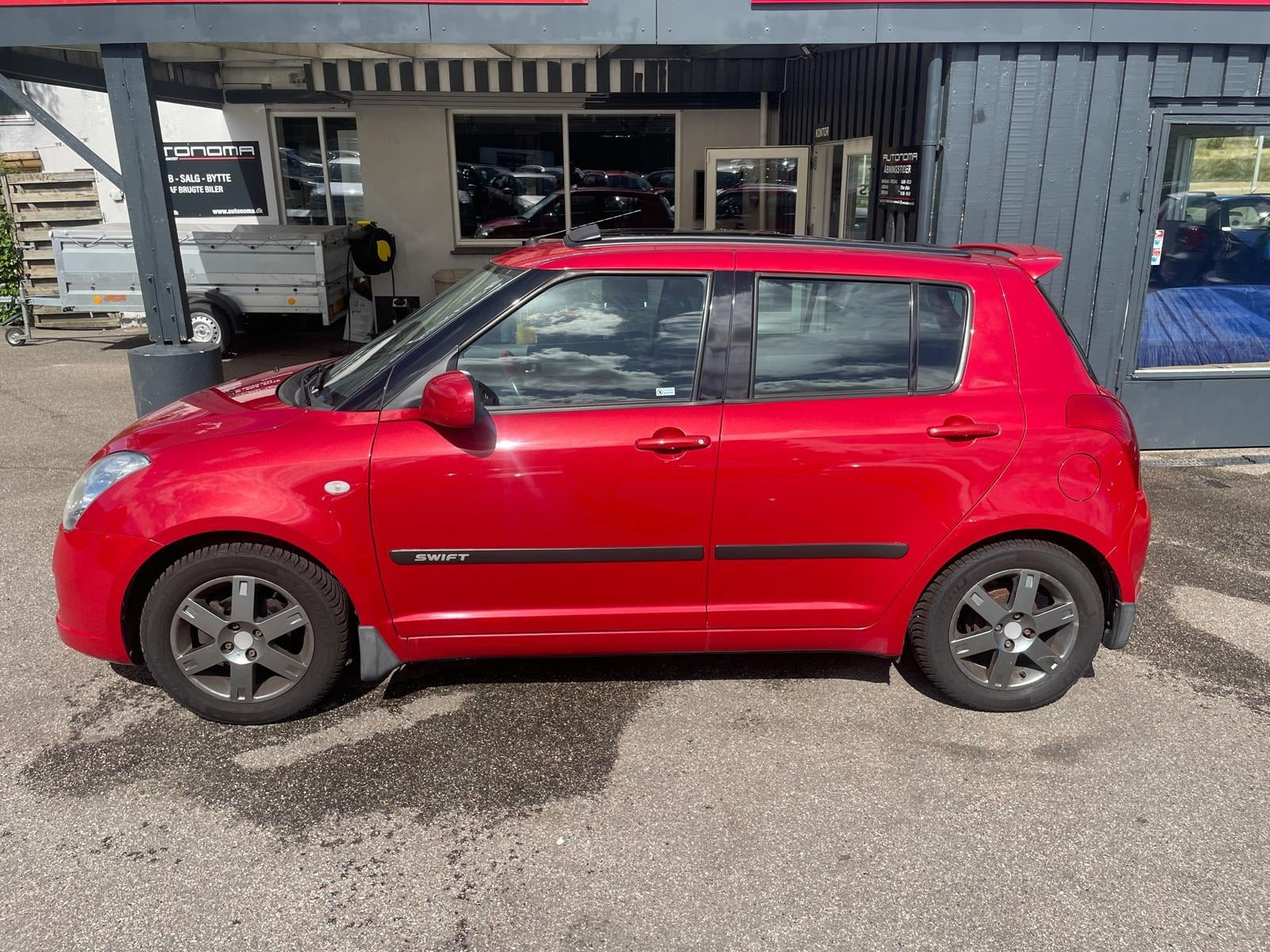 Rød Suzuki Swift fra 2007