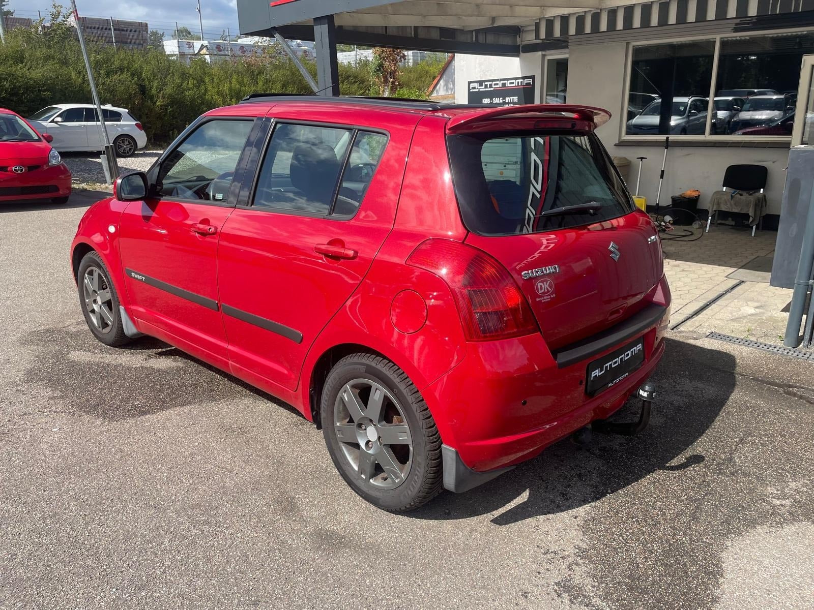 Rød Suzuki Swift fra 2007