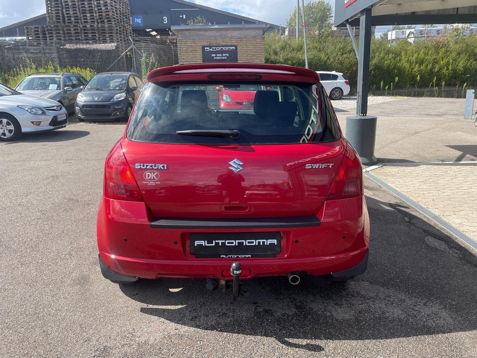 Rød Suzuki Swift fra 2007