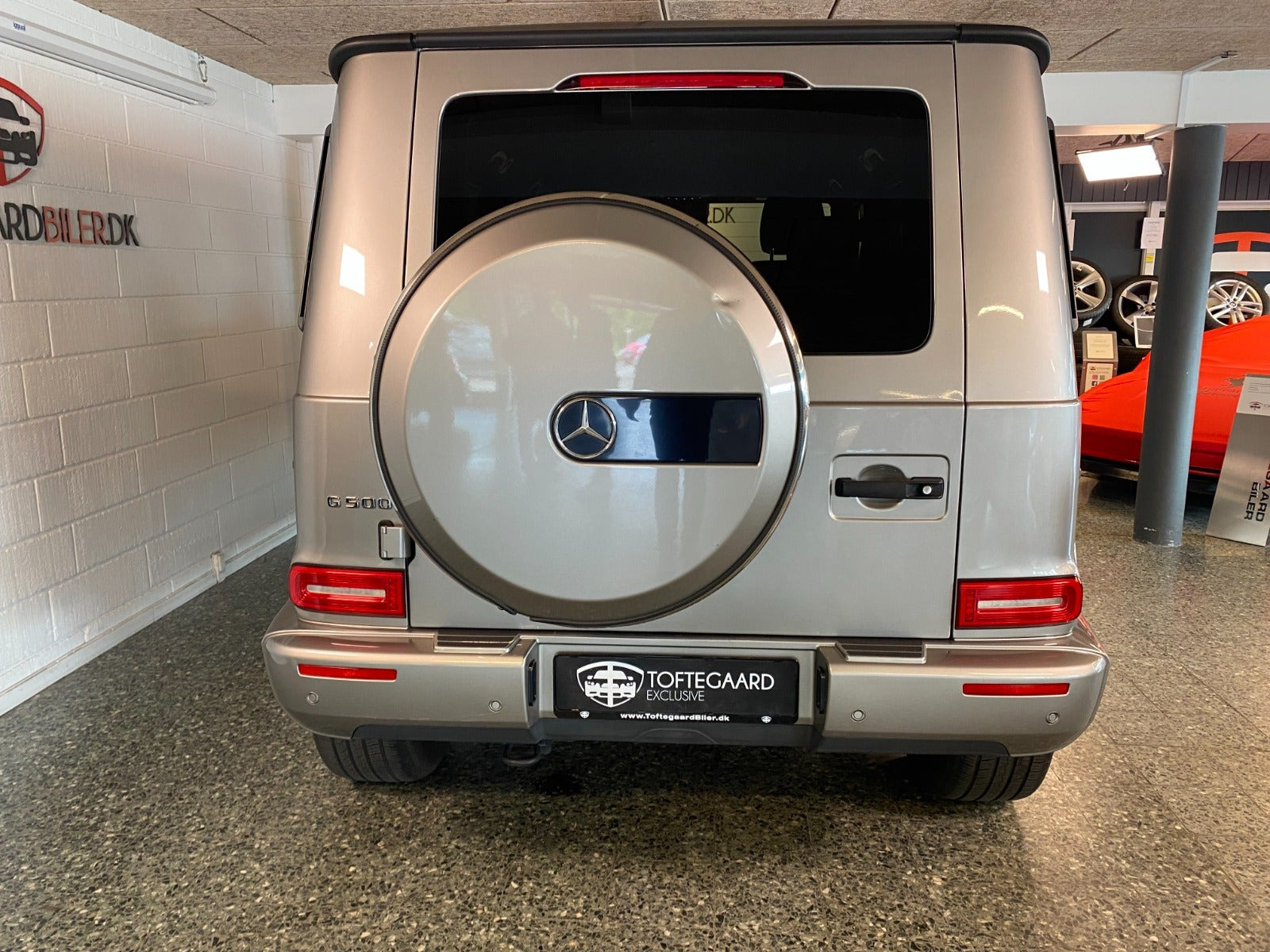 Orange Mercedes G500 fra 2018