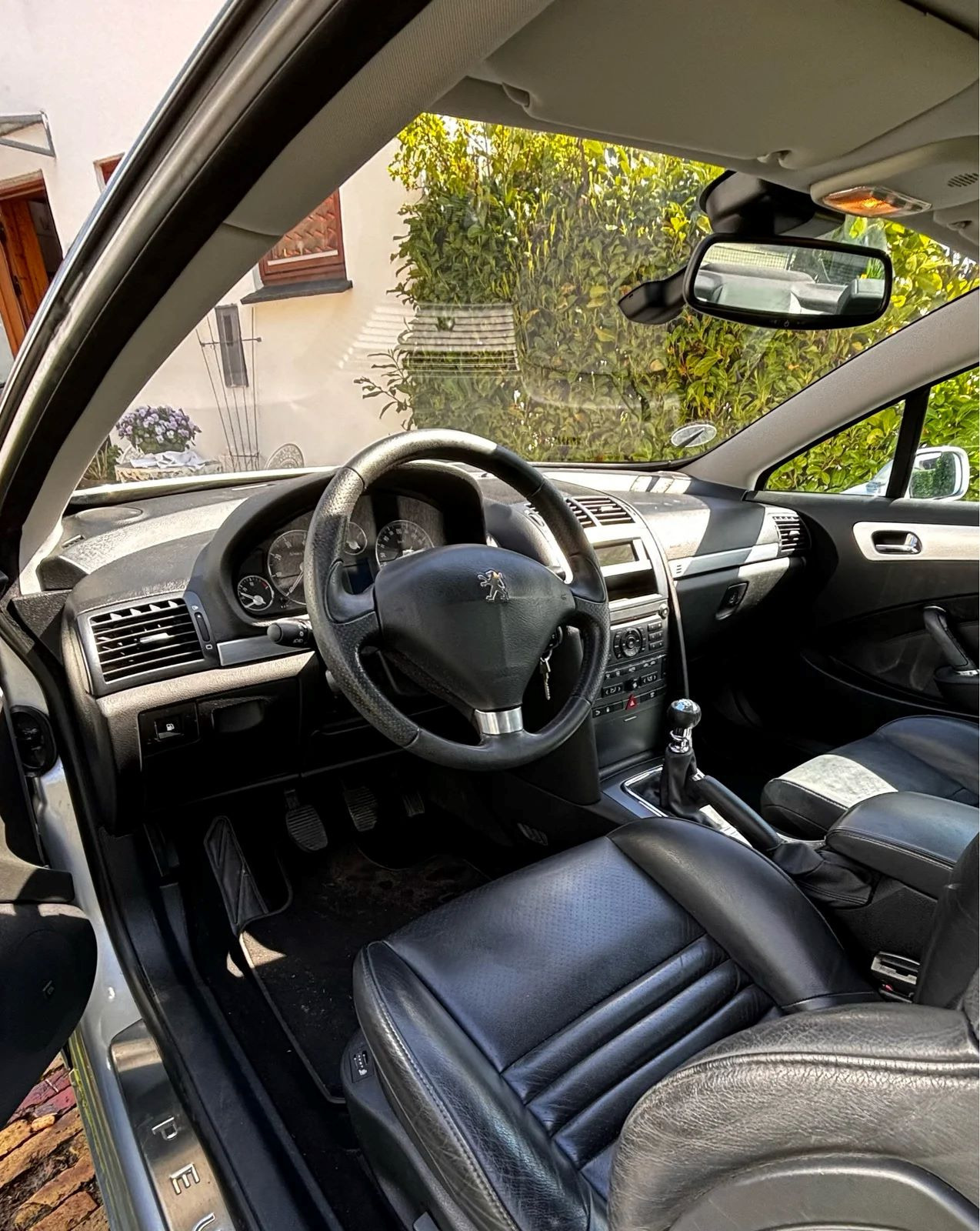 Sølv Peugeot 407 fra 2006
