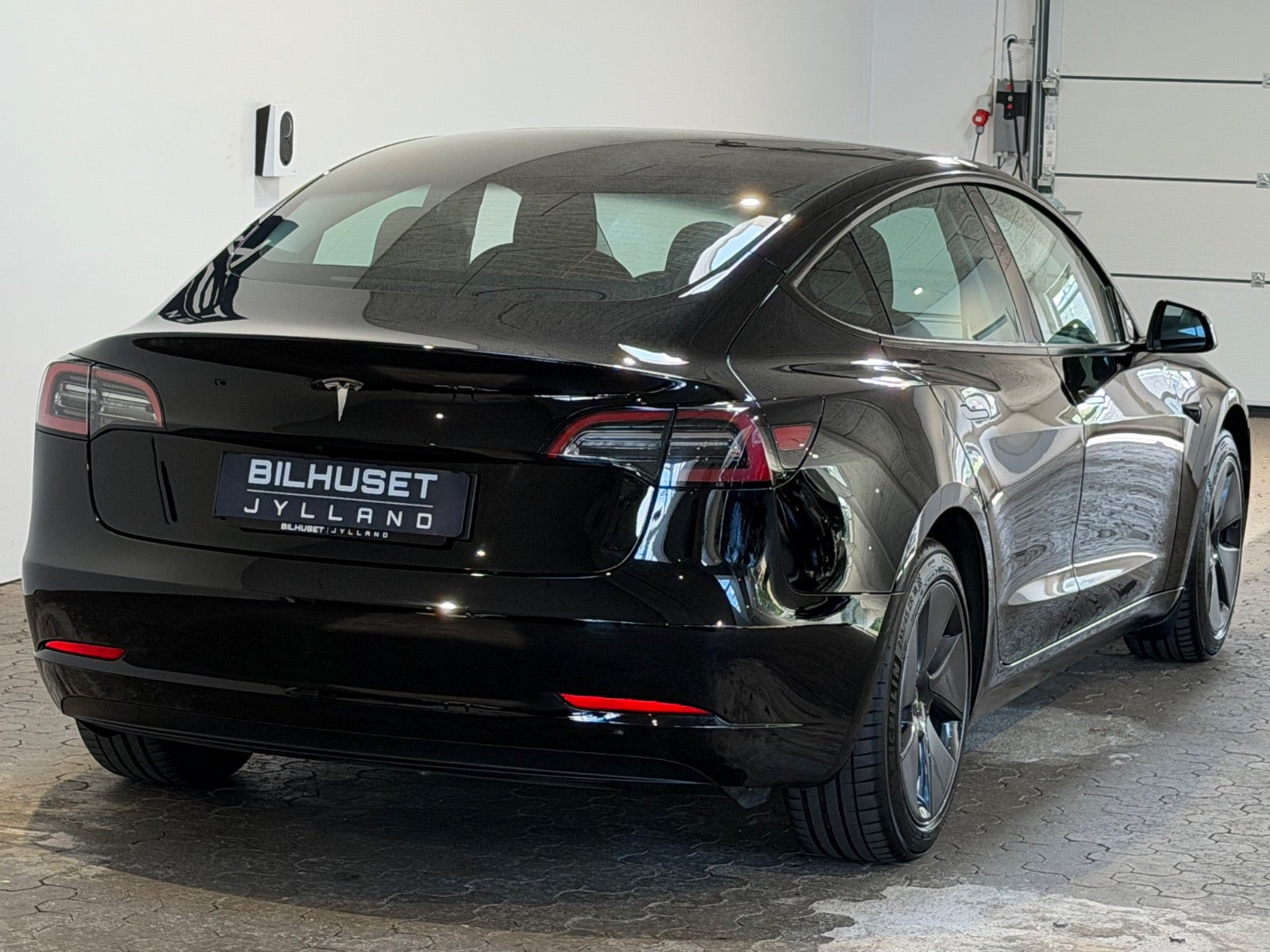 Sort Tesla Model 3 fra 2023