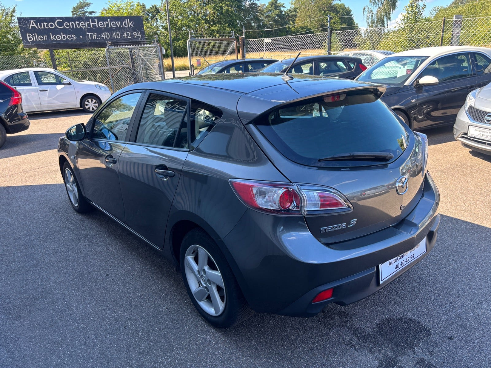 Grå Mazda 3 fra 2011