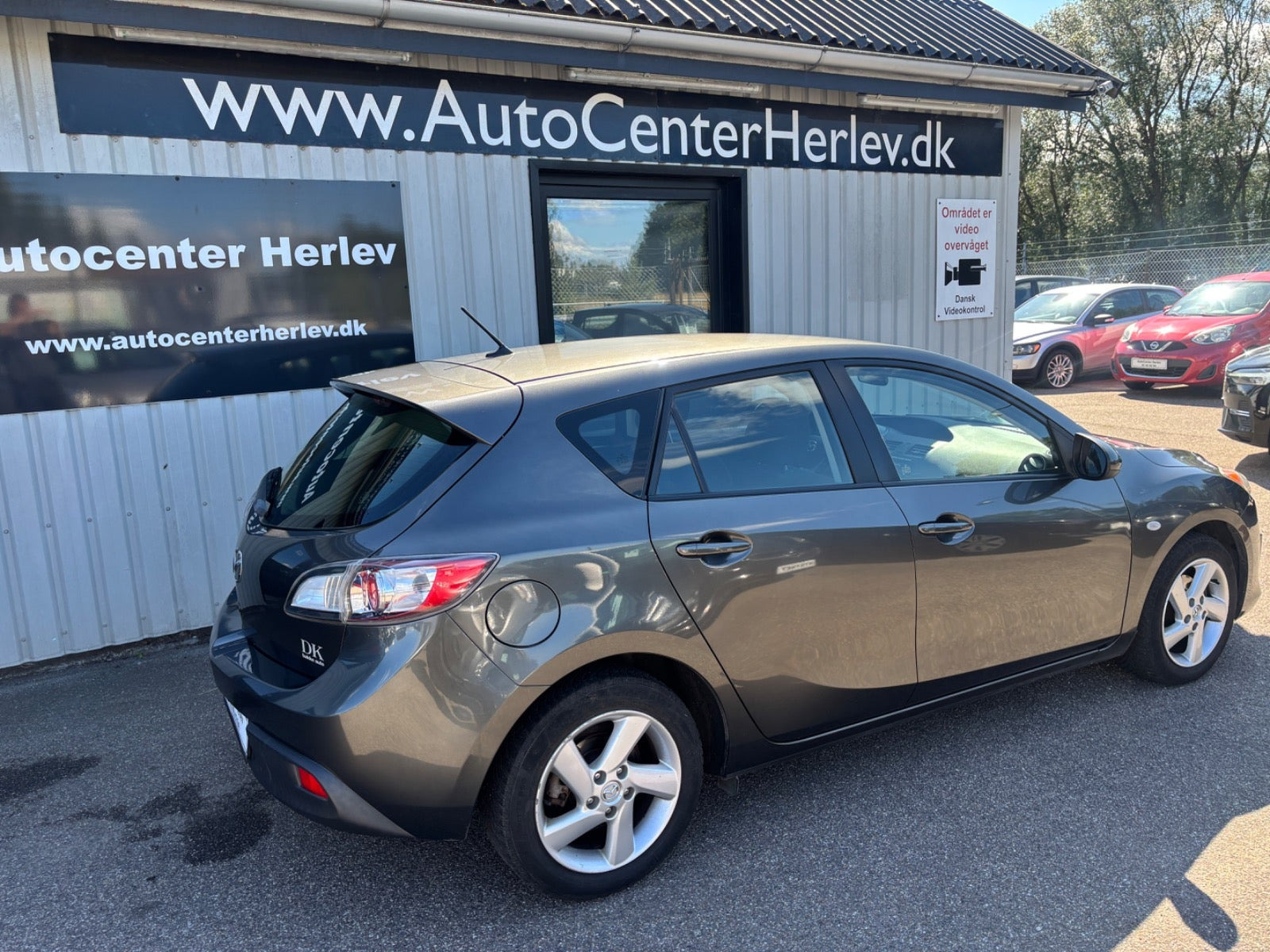 Grå Mazda 3 fra 2011
