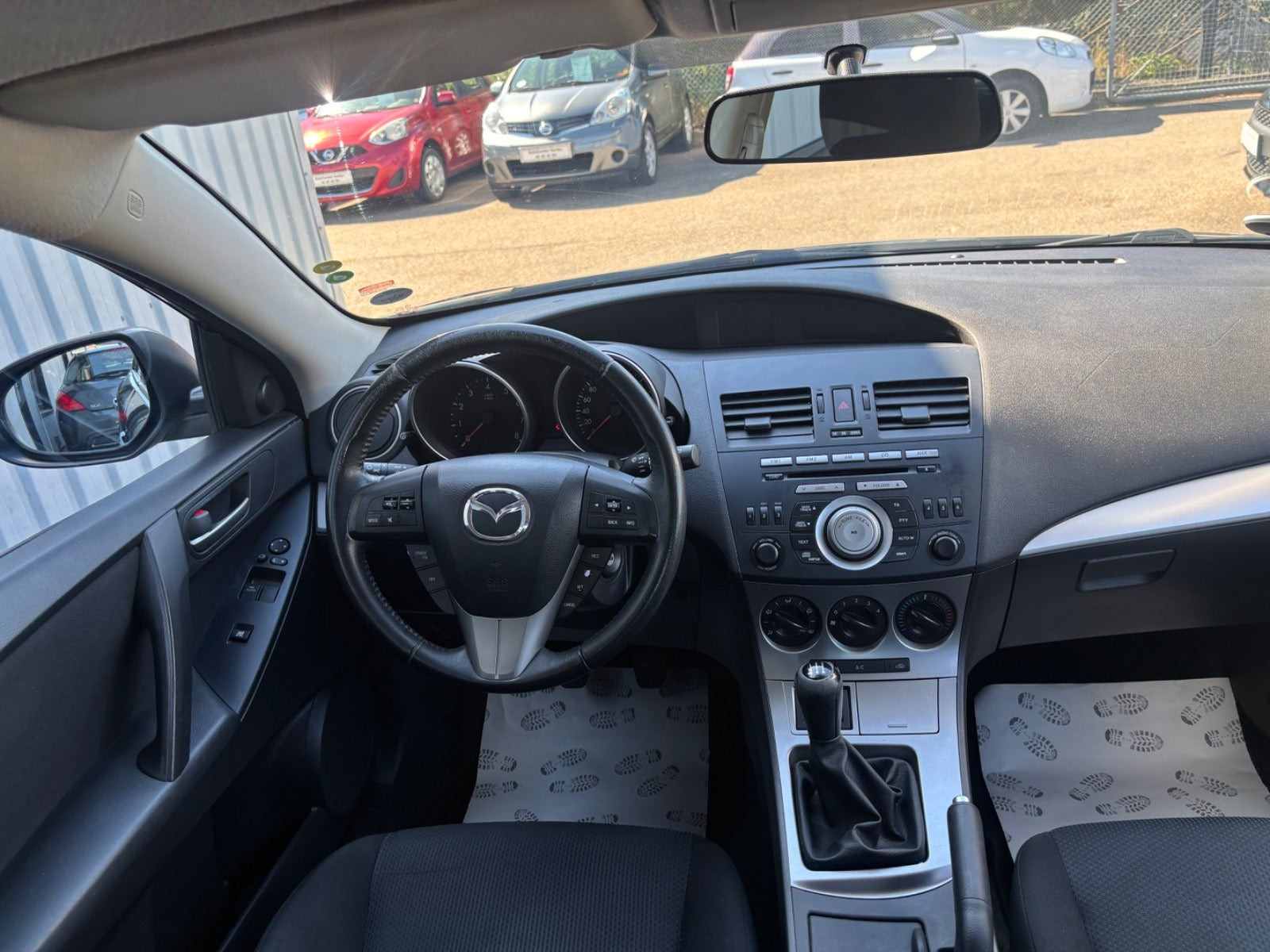 Grå Mazda 3 fra 2011