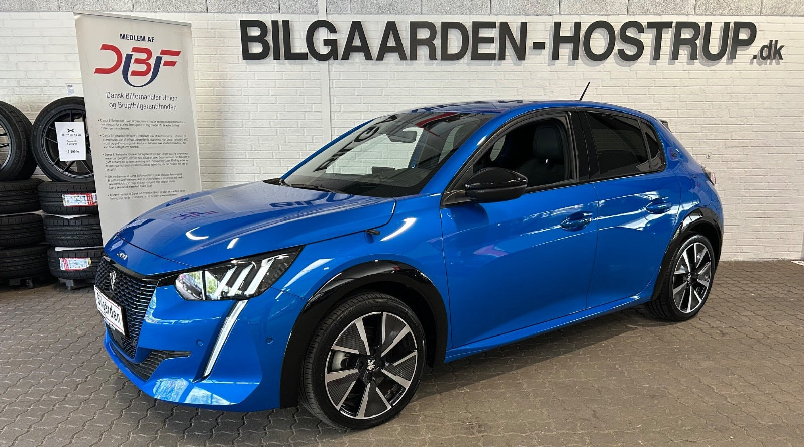 Blå Peugeot e-208 fra 2021