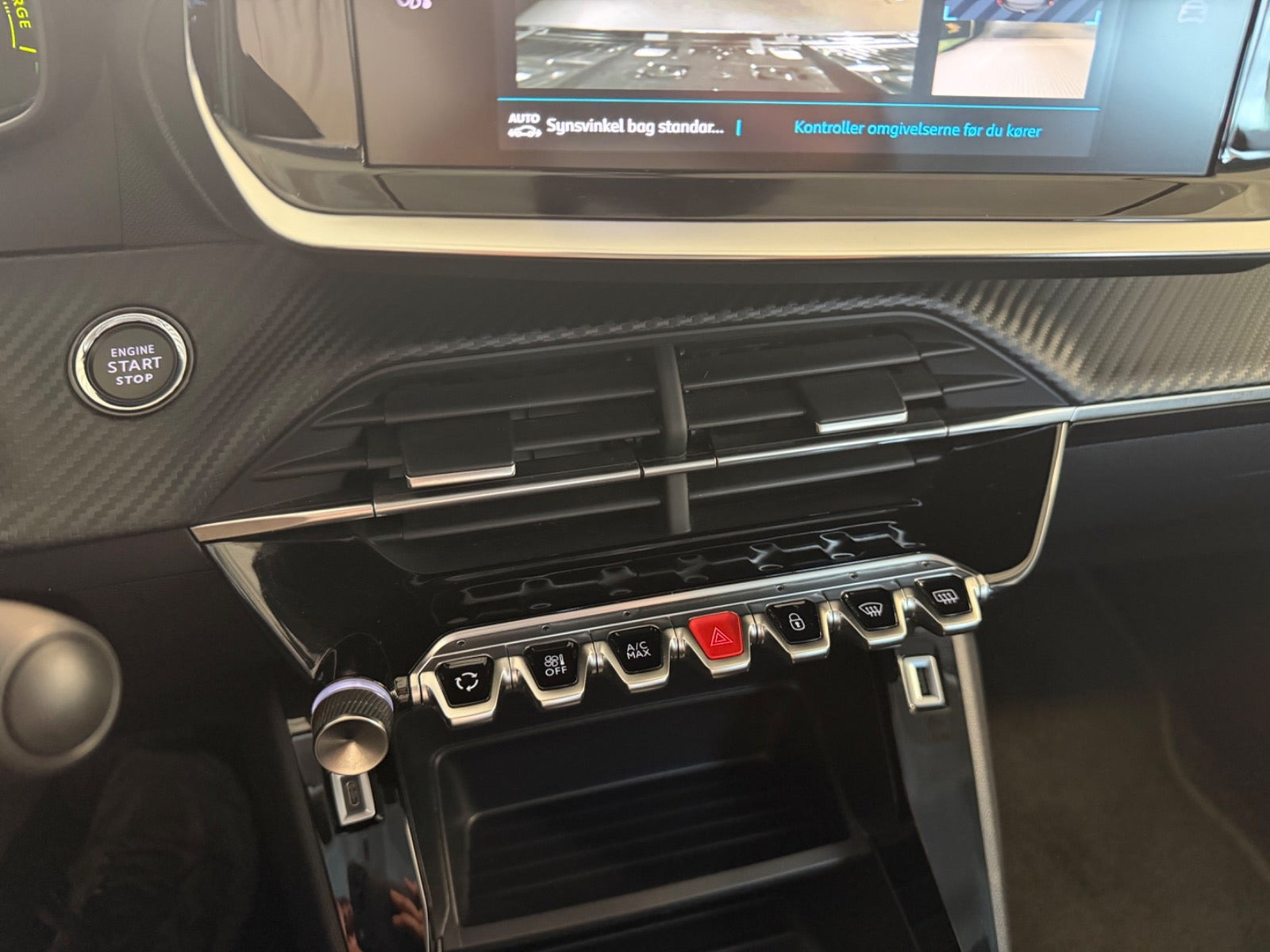 Sølv Peugeot e-208 fra 2023