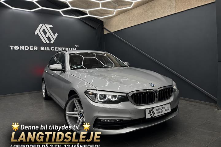 Sølv BMW 520d fra 2018 set udefra
