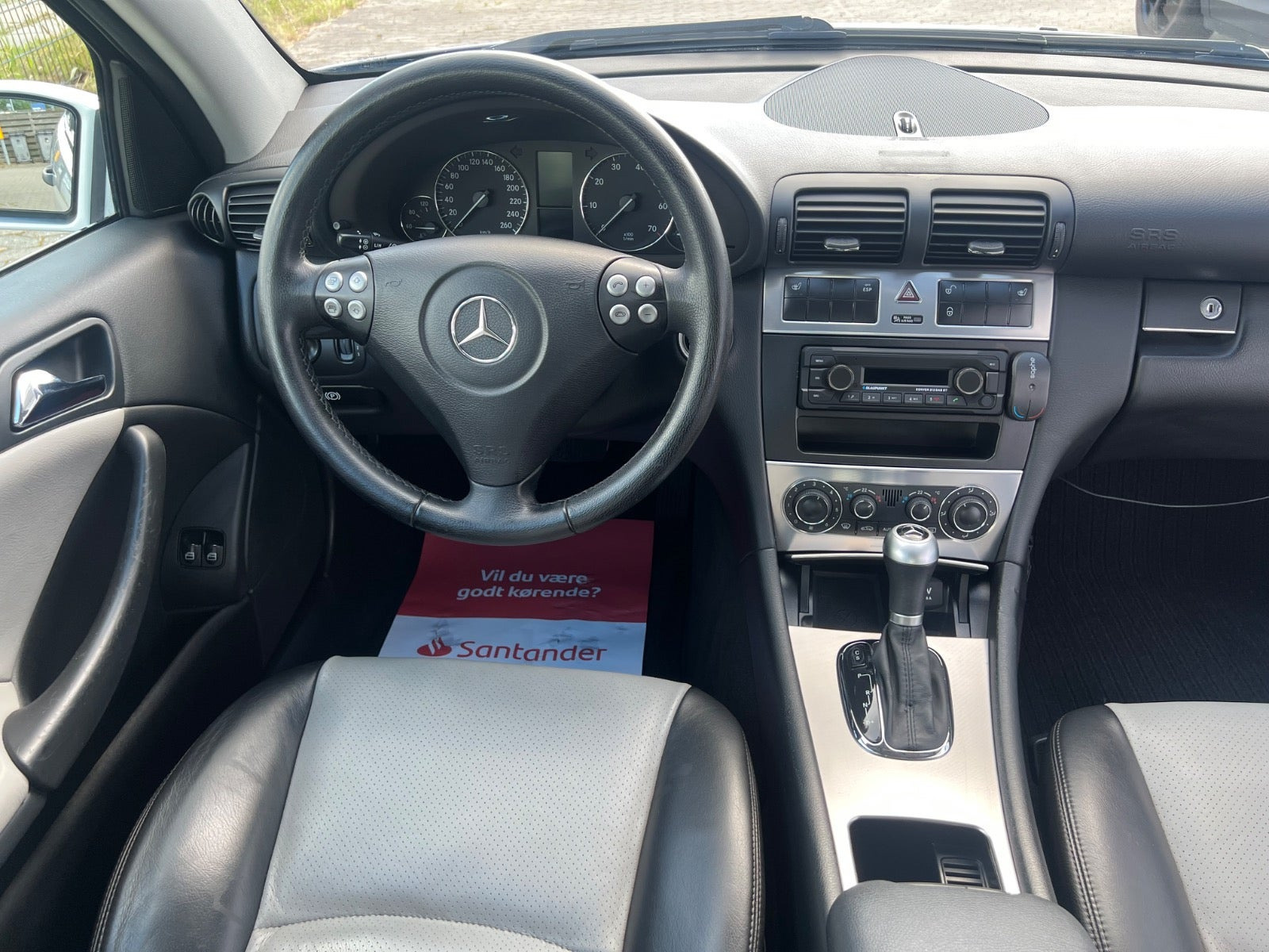 Sølv Mercedes C180 fra 2006