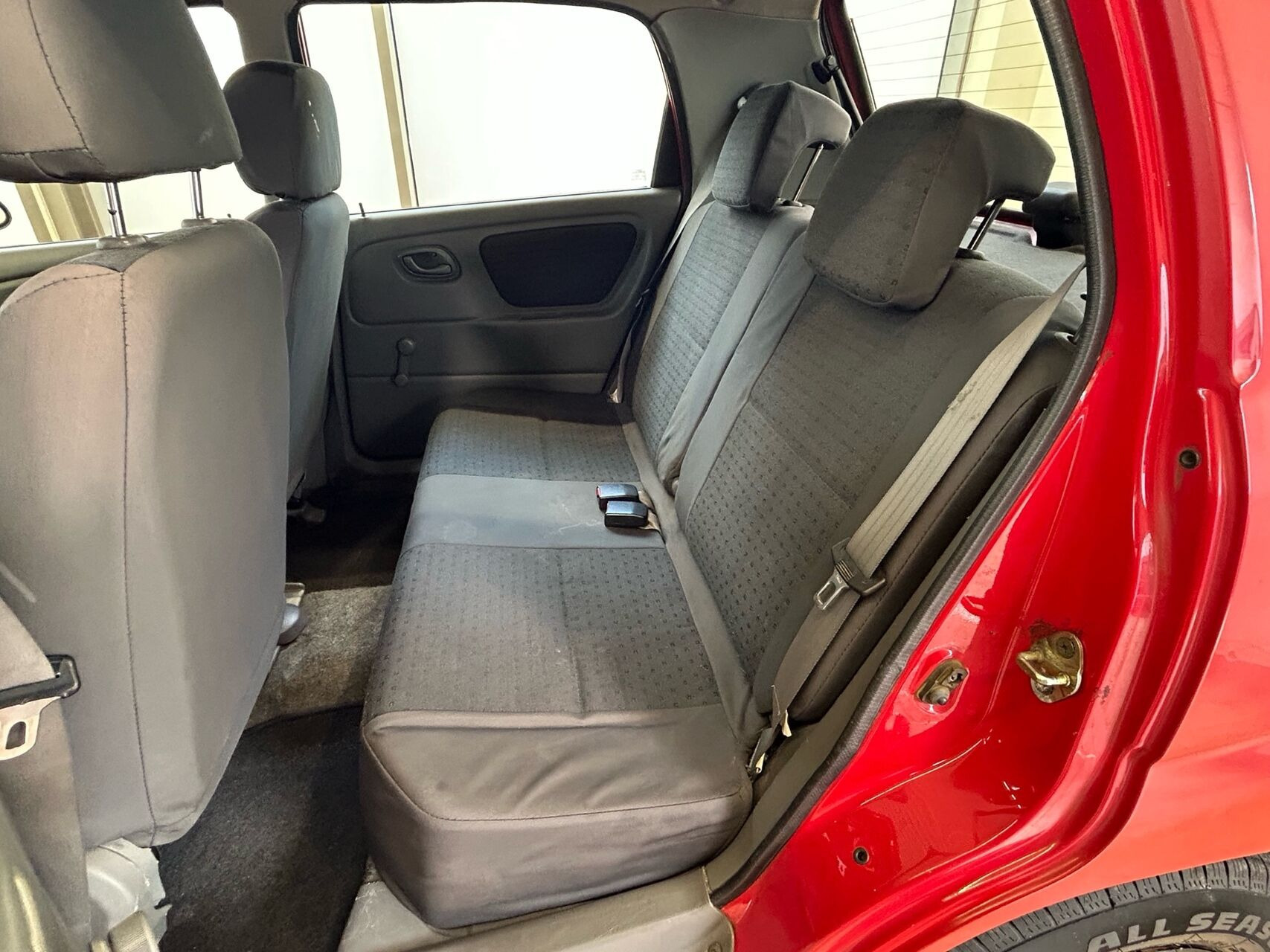 Rød Suzuki Alto fra 2004