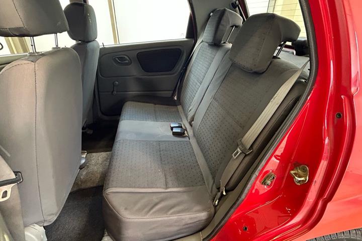 Rød Suzuki Alto fra 2004