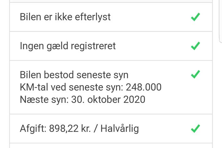 Gul Toyota Yaris fra 2002