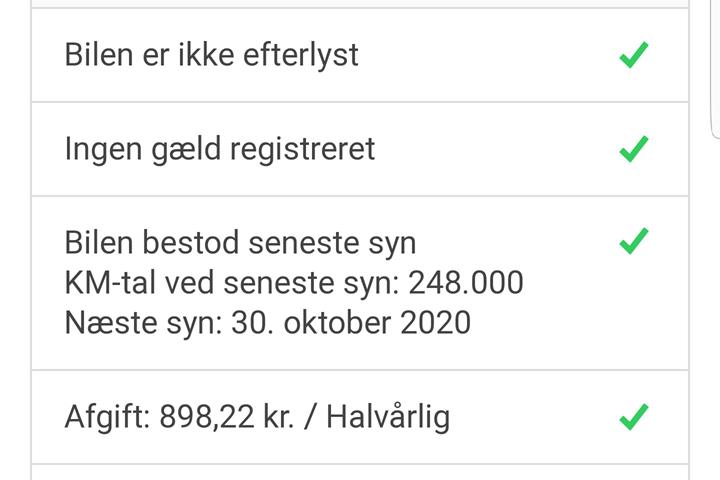 Gul Toyota Yaris fra 2002