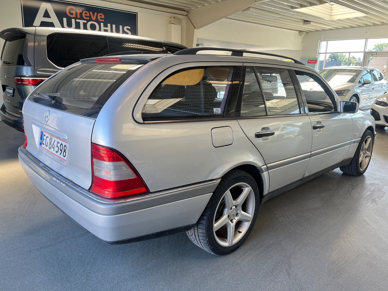 Sølv Mercedes C230 fra 1996