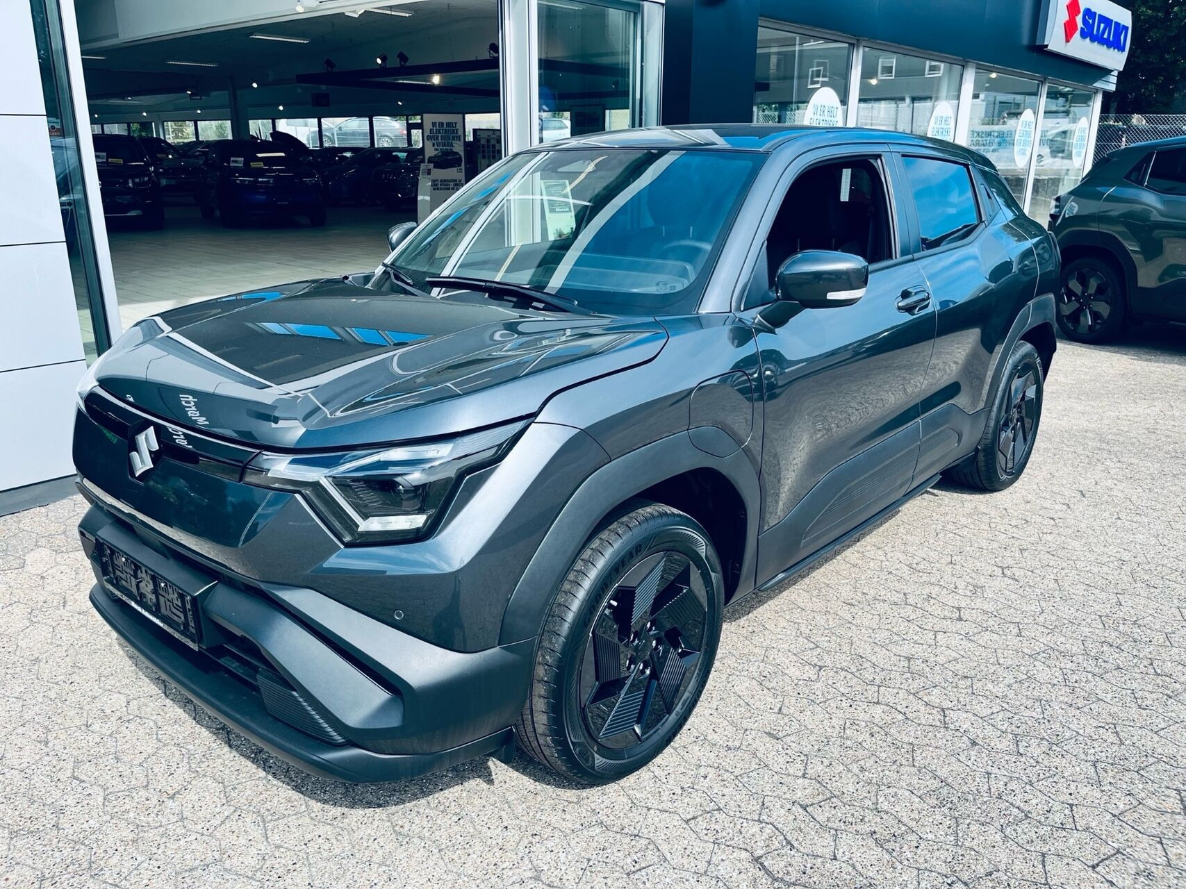 Grå Suzuki e fra 2026