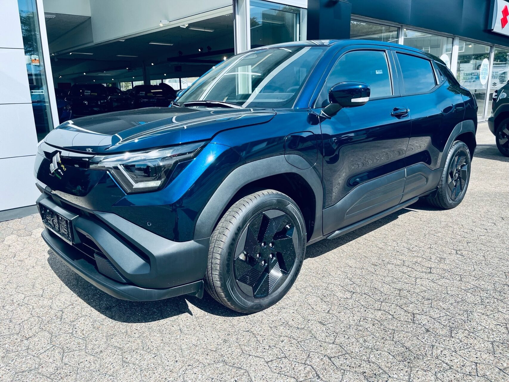 Blå Suzuki e fra 2026
