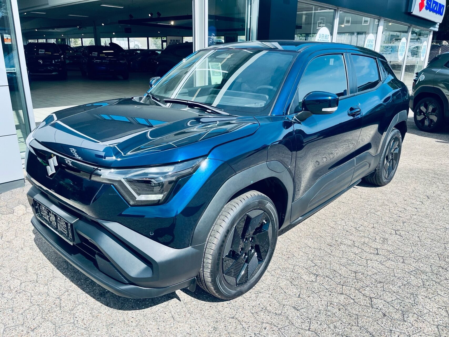 Blå Suzuki e fra 2026