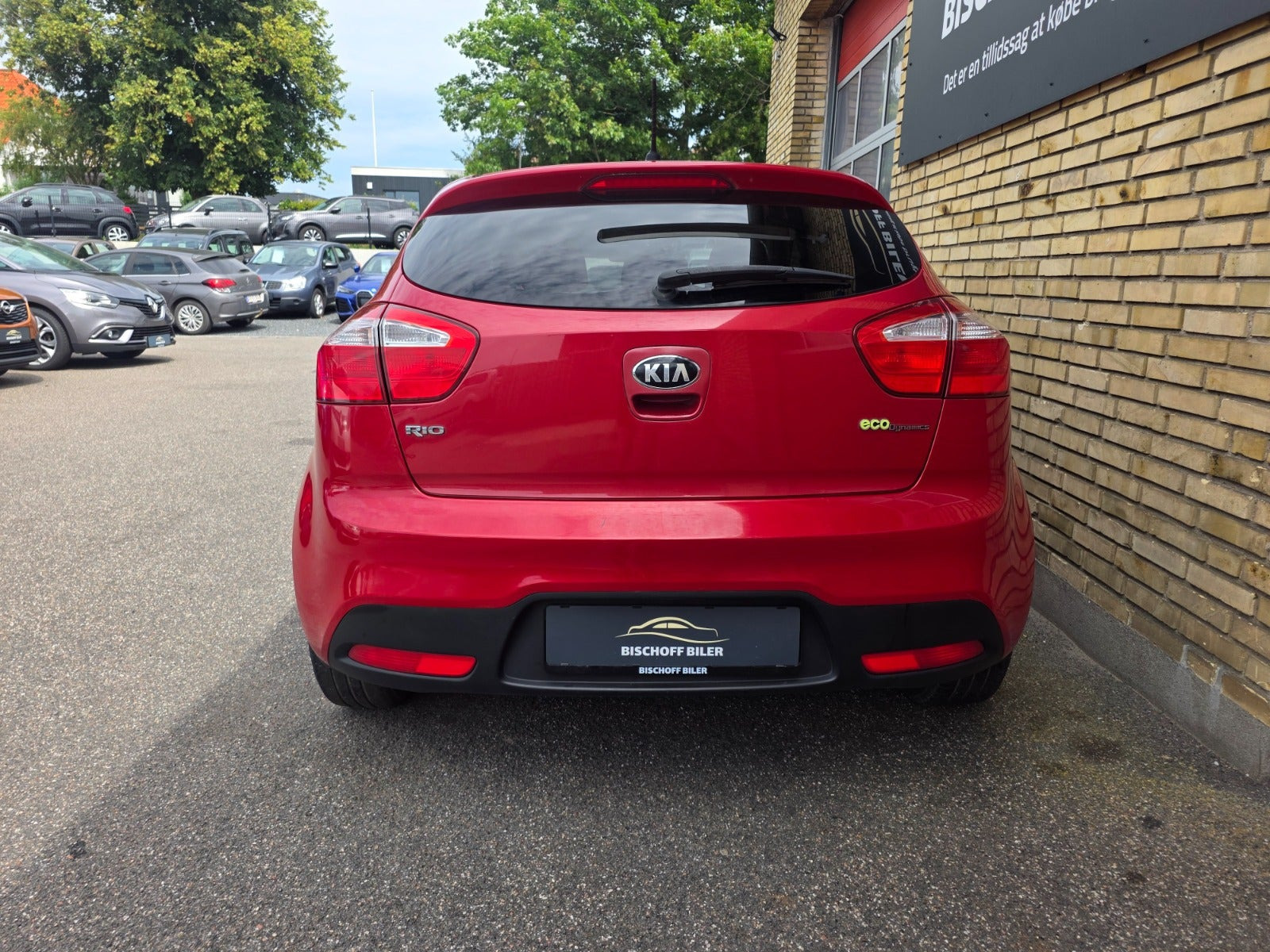 Rød Kia Rio fra 2014