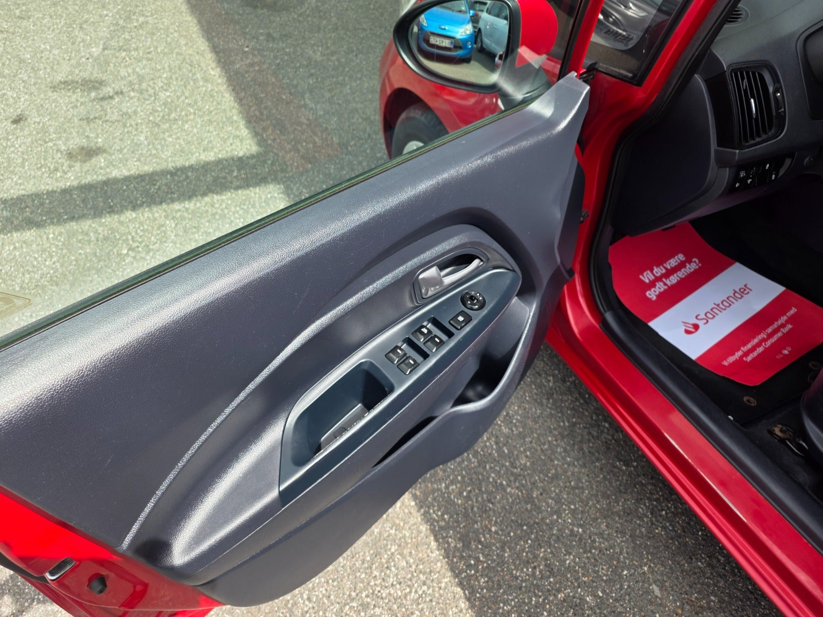 Rød Kia Rio fra 2014