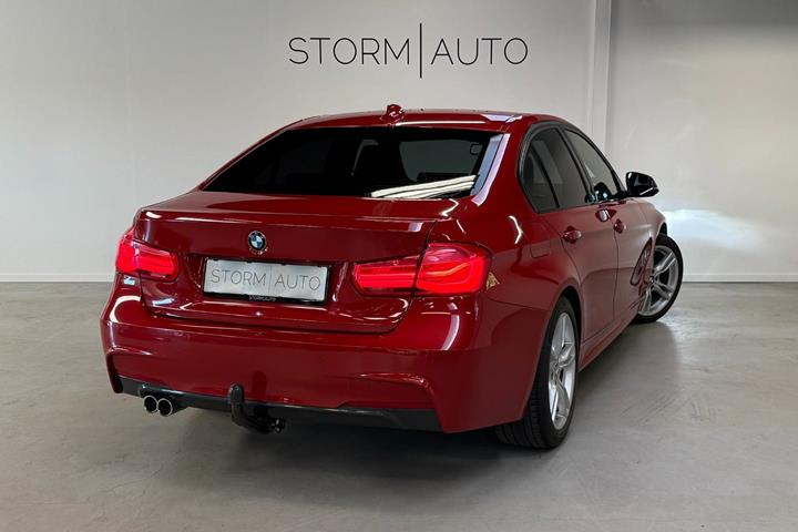 Rød BMW 320d fra 2018