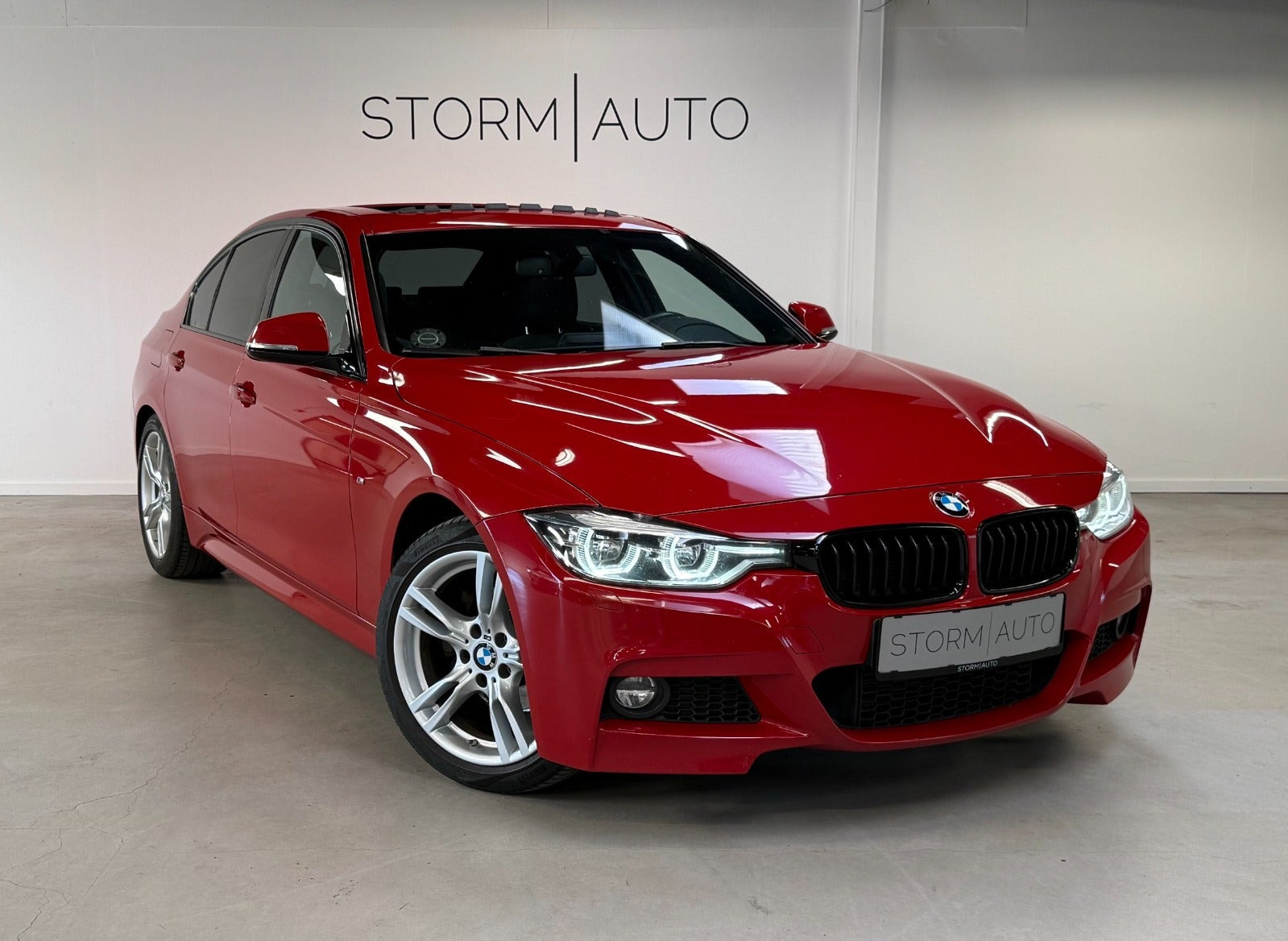 Rød BMW 320d fra 2018