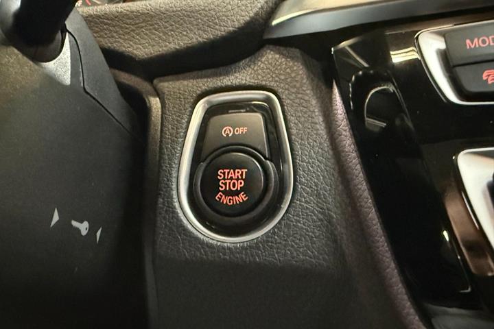 Rød BMW 320d fra 2018