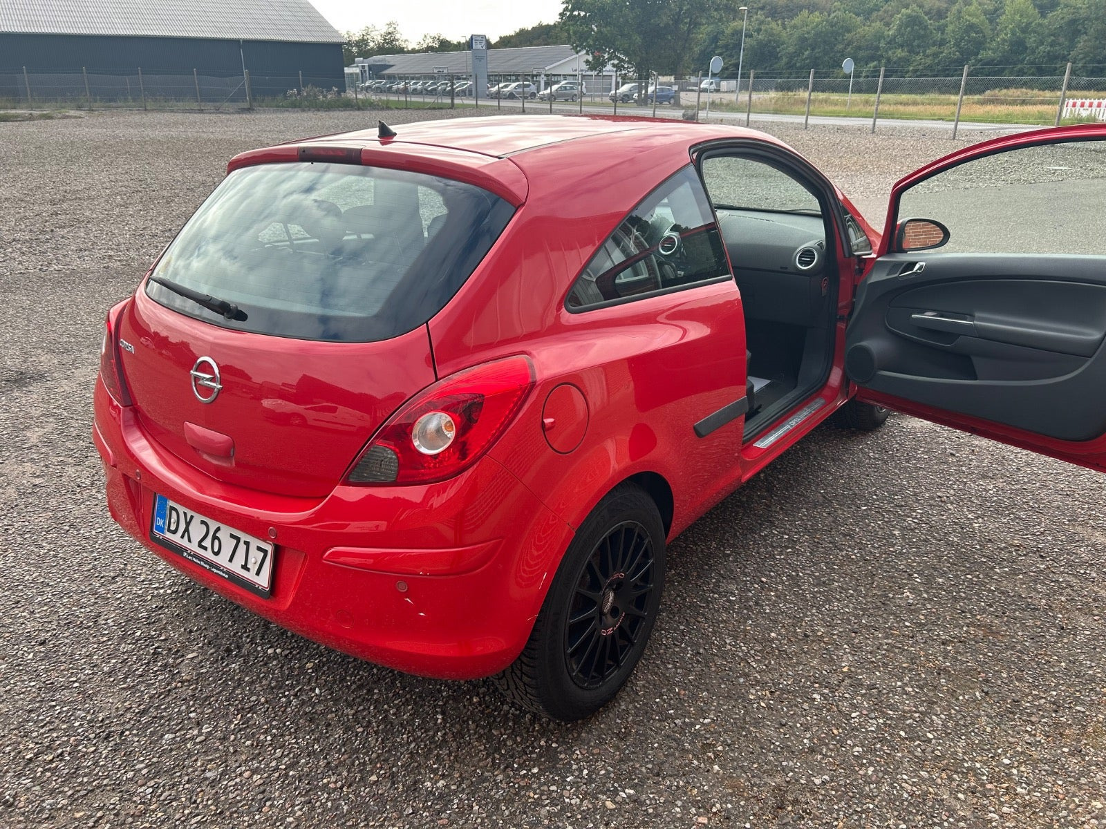 Rød Opel Corsa fra 2011