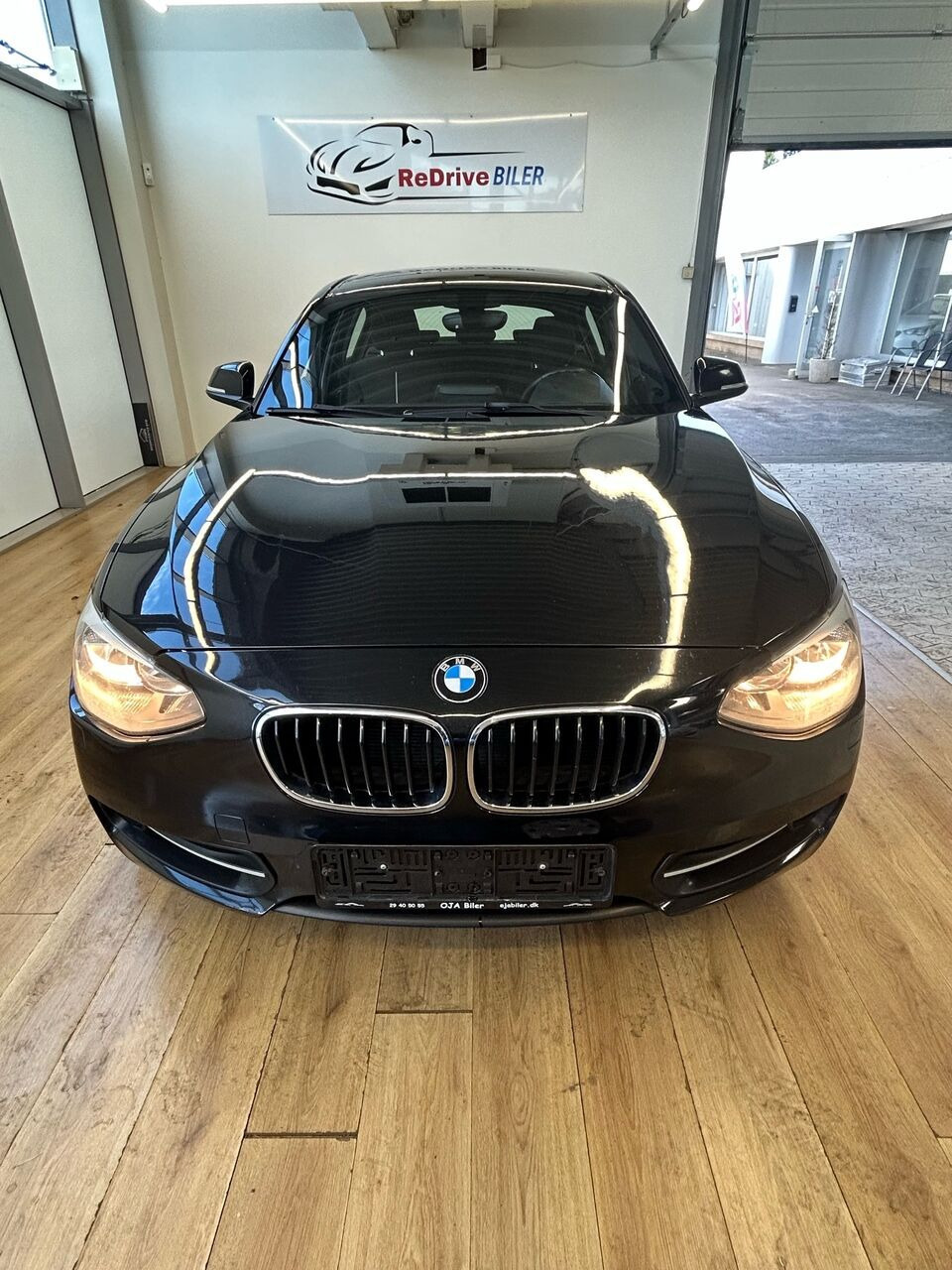 Sort BMW 118d fra 2011