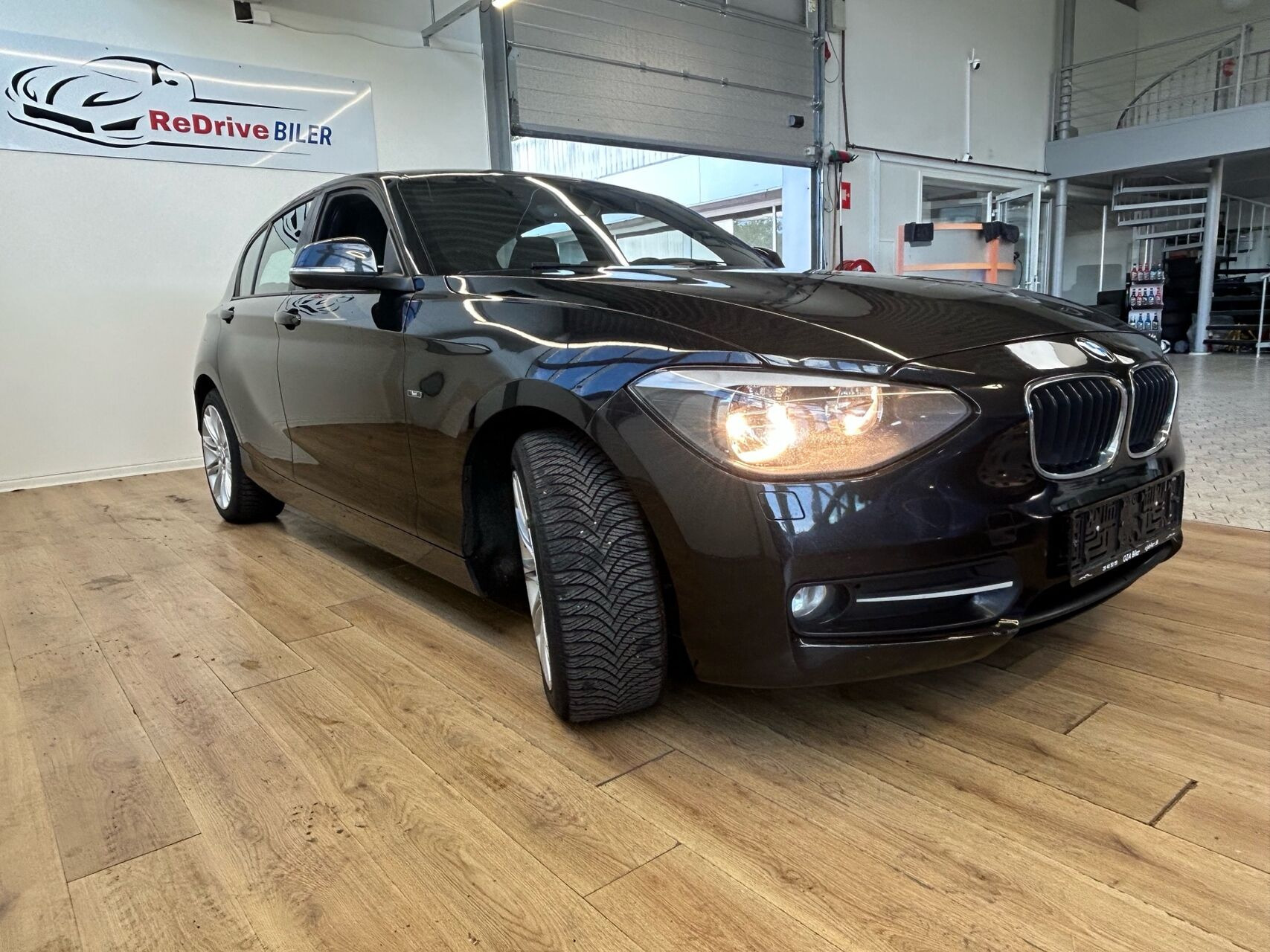 Sort BMW 118d fra 2011