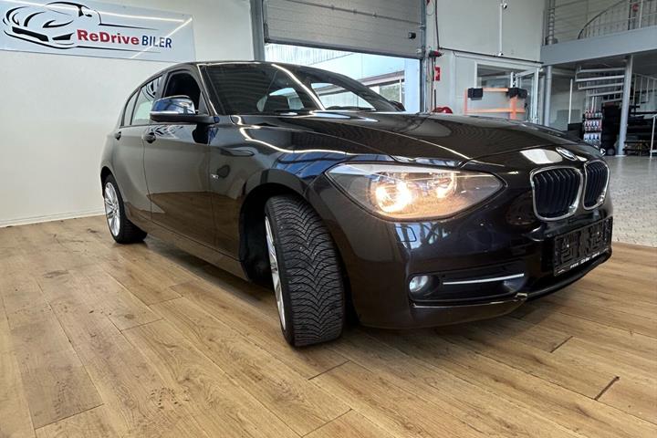 Sort BMW 118d fra 2011