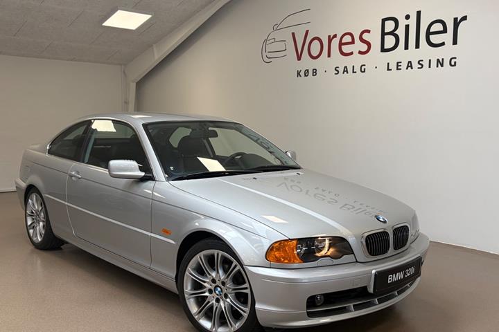 Sølv BMW 320i fra 1999