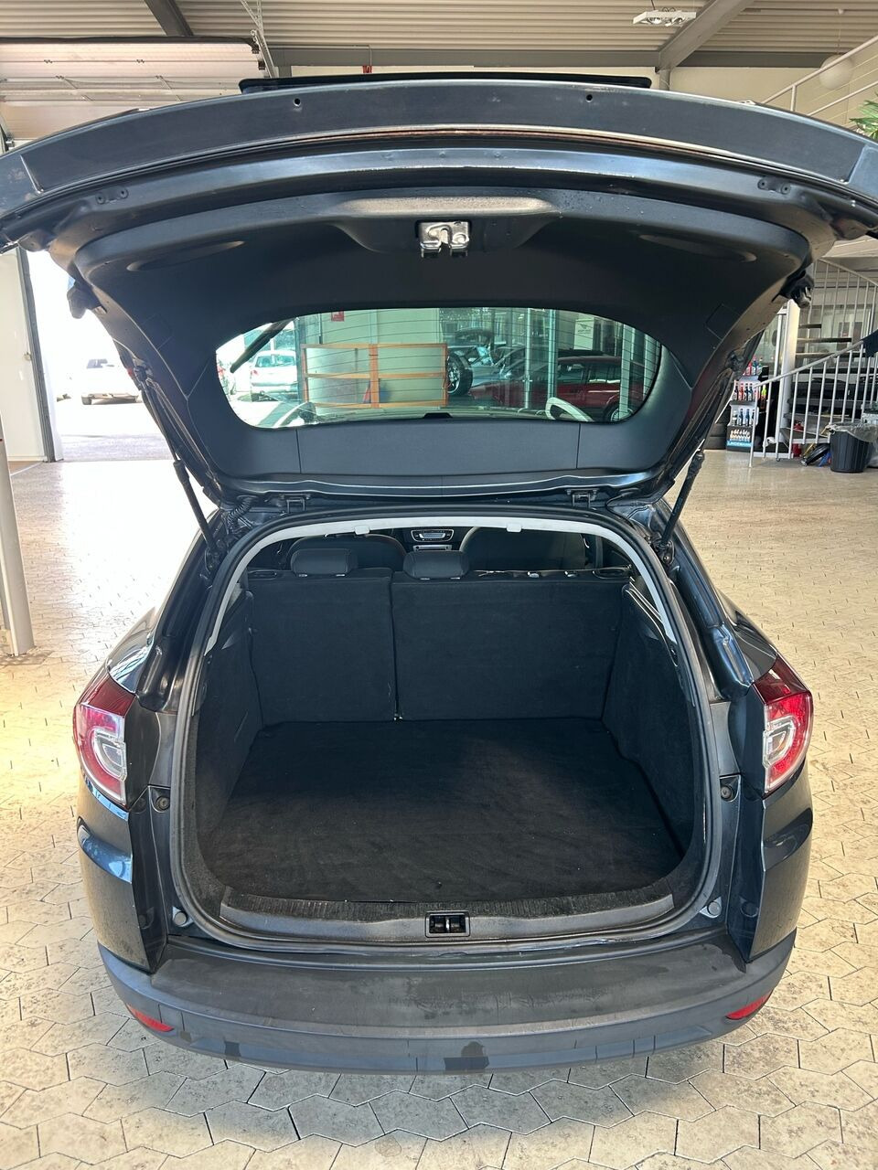 Grå Renault Mégane fra 2013