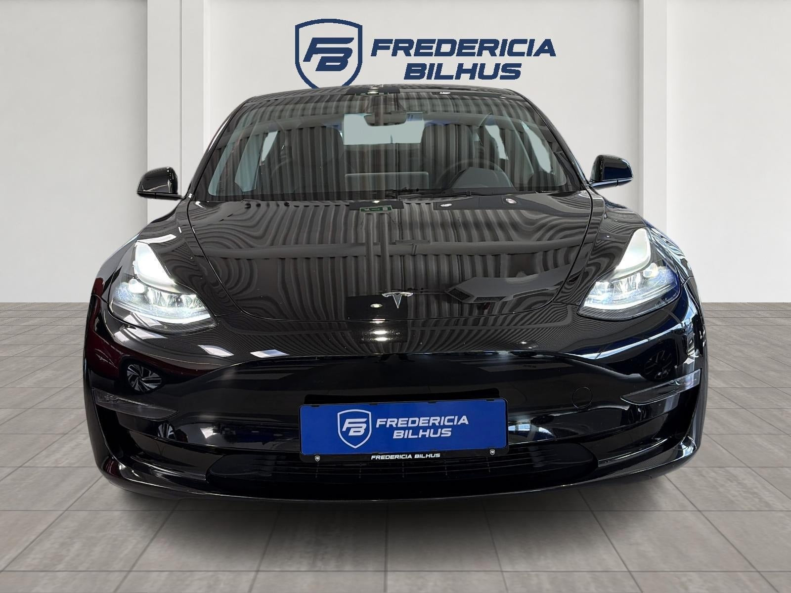 Sort Tesla Model 3 fra 2023