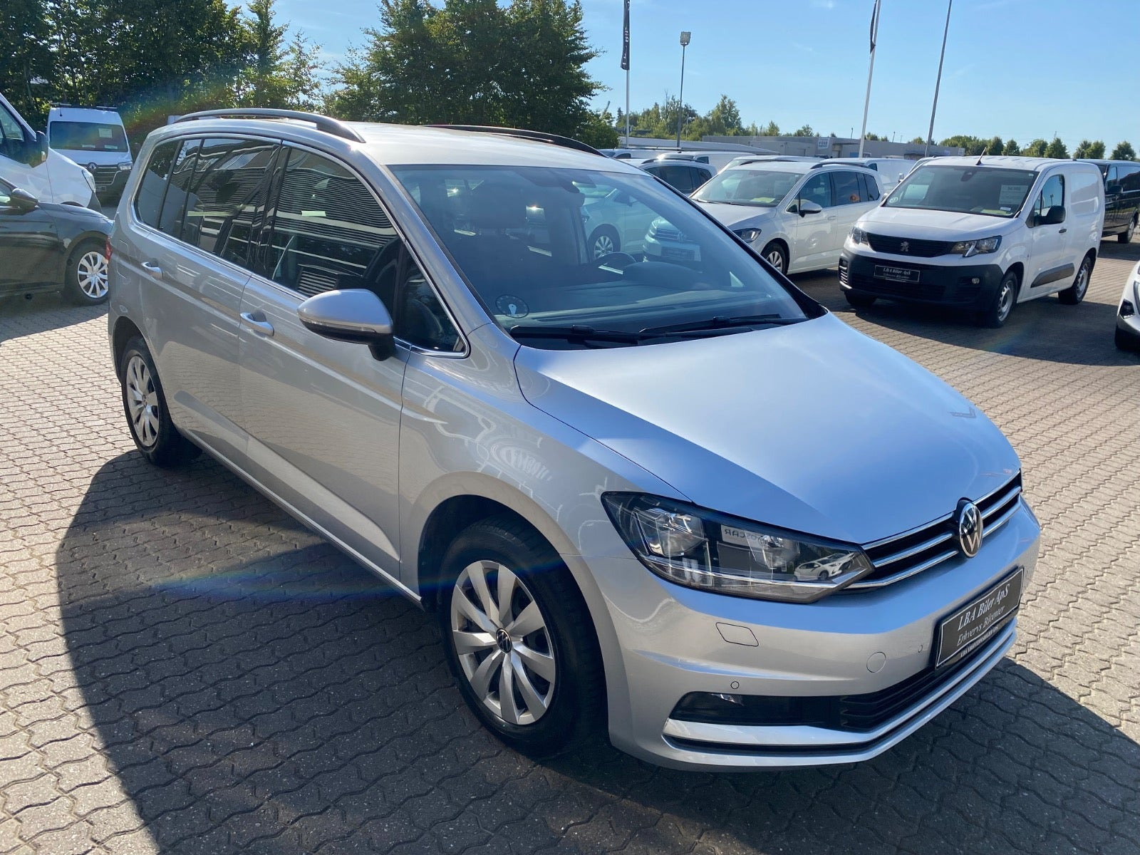 Sølv VW Touran fra 2021