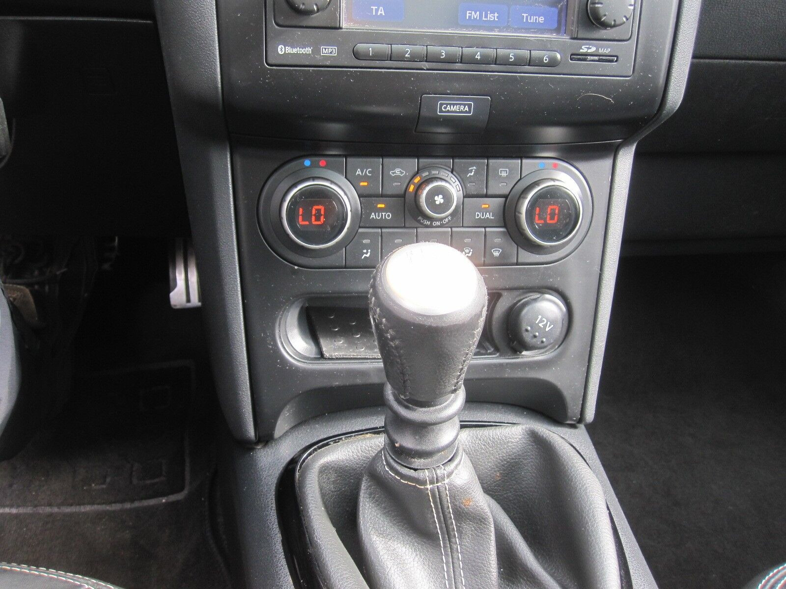 Blå Nissan Qashqai+2 fra 2013