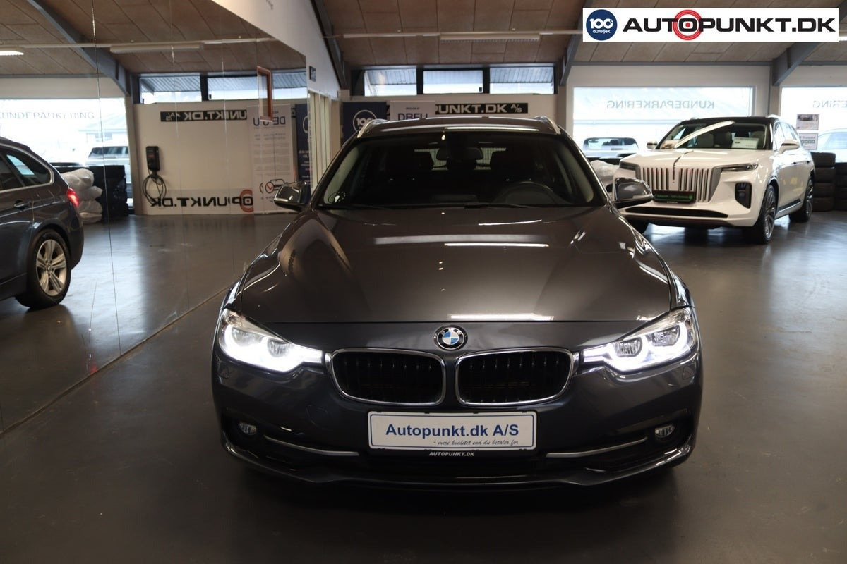 Grå BMW 320d fra 2018