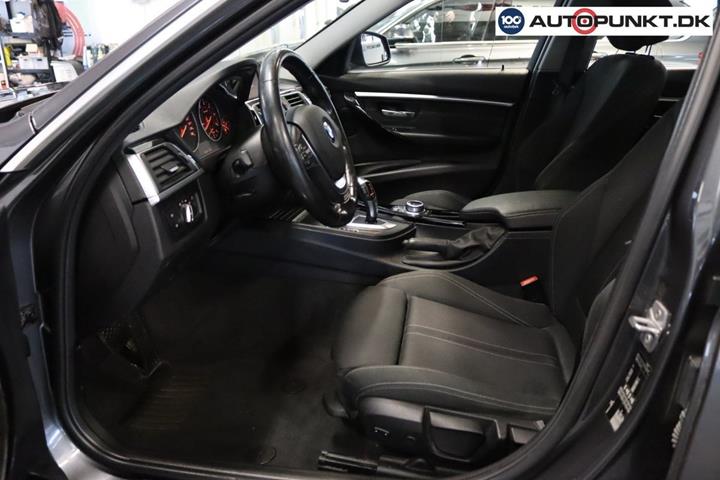 Grå BMW 320d fra 2018