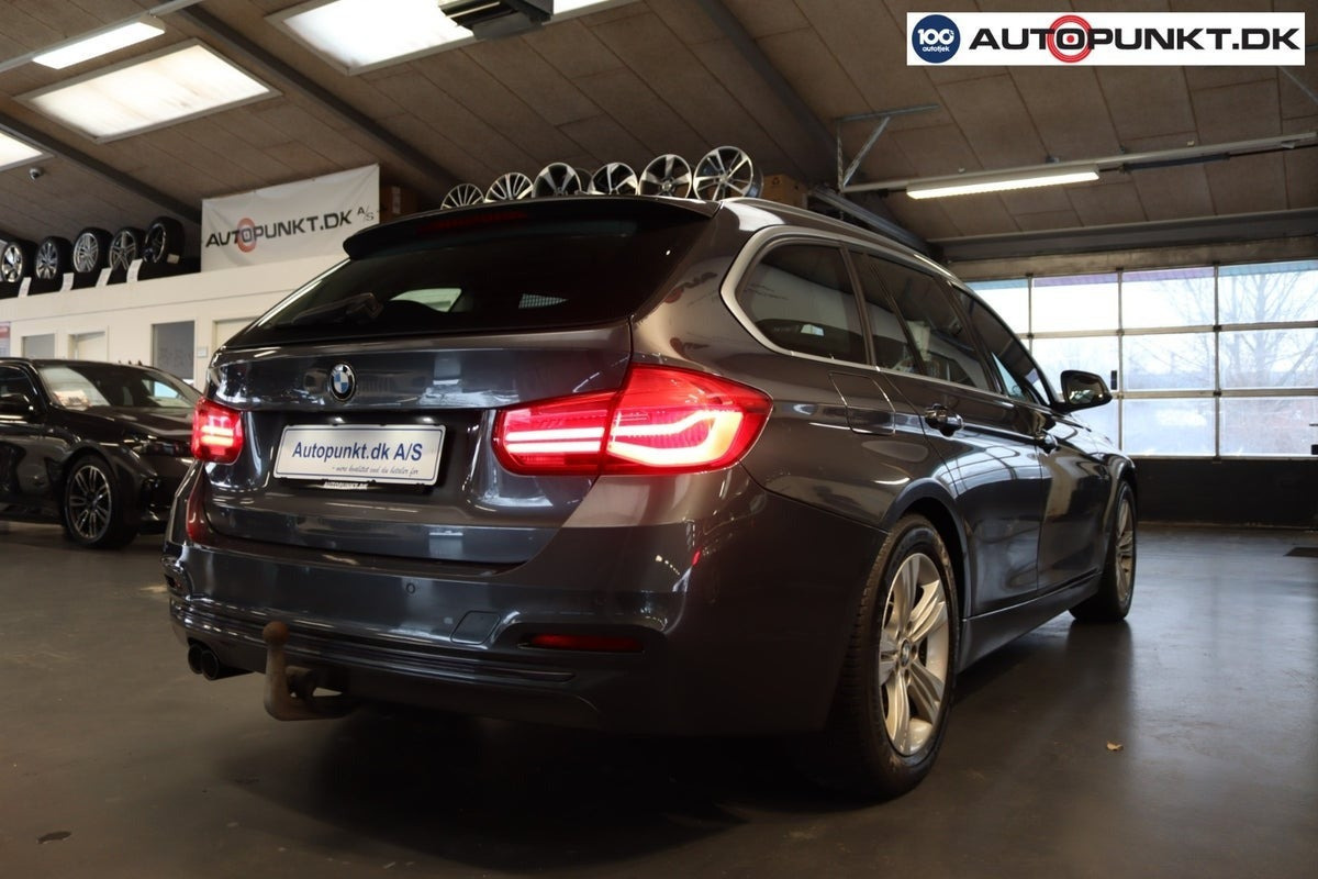Grå BMW 320d fra 2018