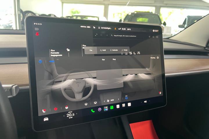 Hvid Tesla Model 3 fra 2023