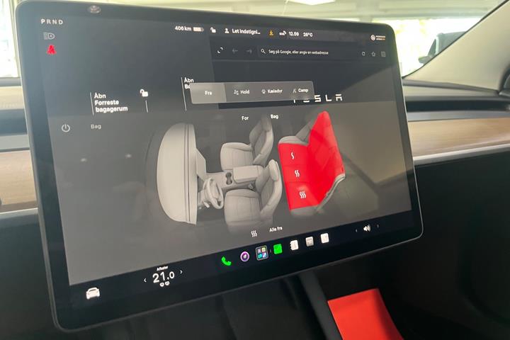 Hvid Tesla Model 3 fra 2023
