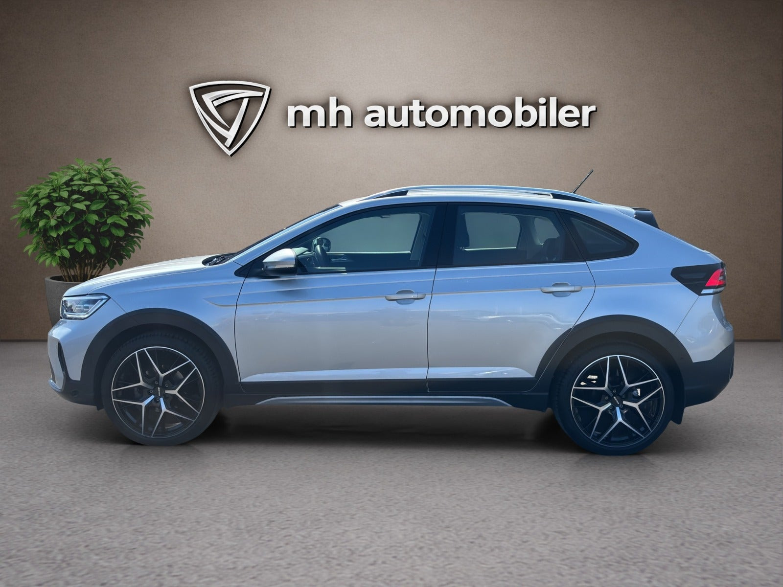 Sølv VW Taigo fra 2022