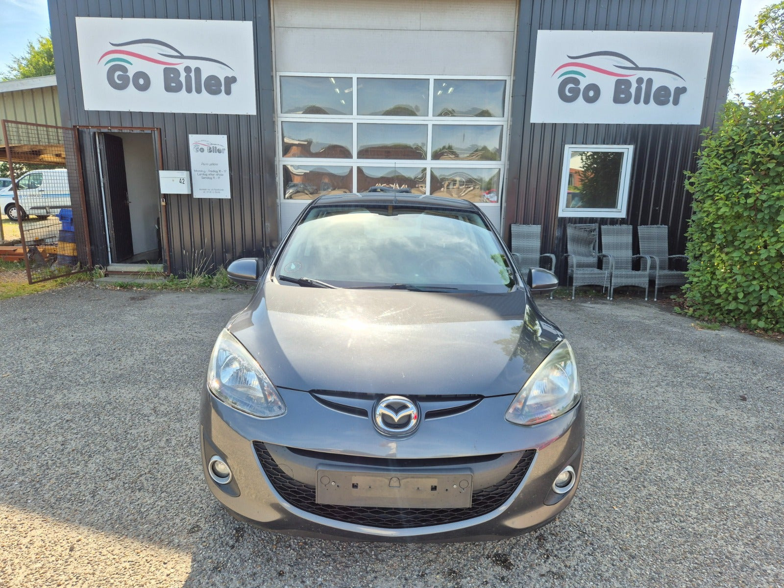 Grøn Mazda 2 fra 2012