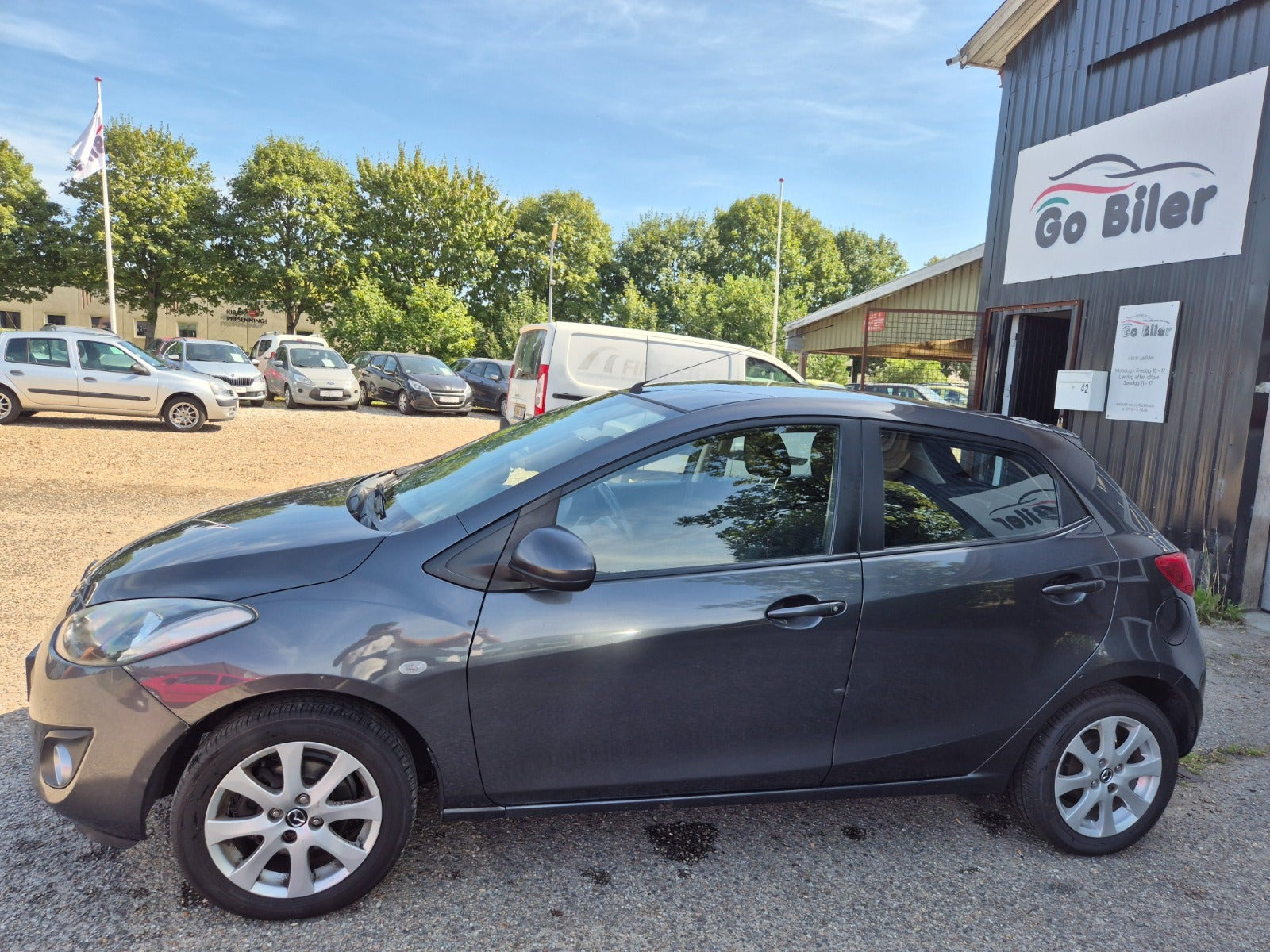 Grøn Mazda 2 fra 2012