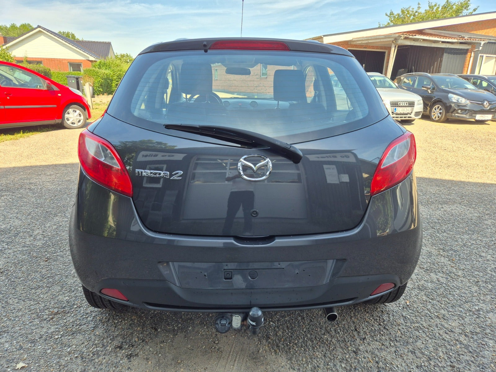 Grøn Mazda 2 fra 2012