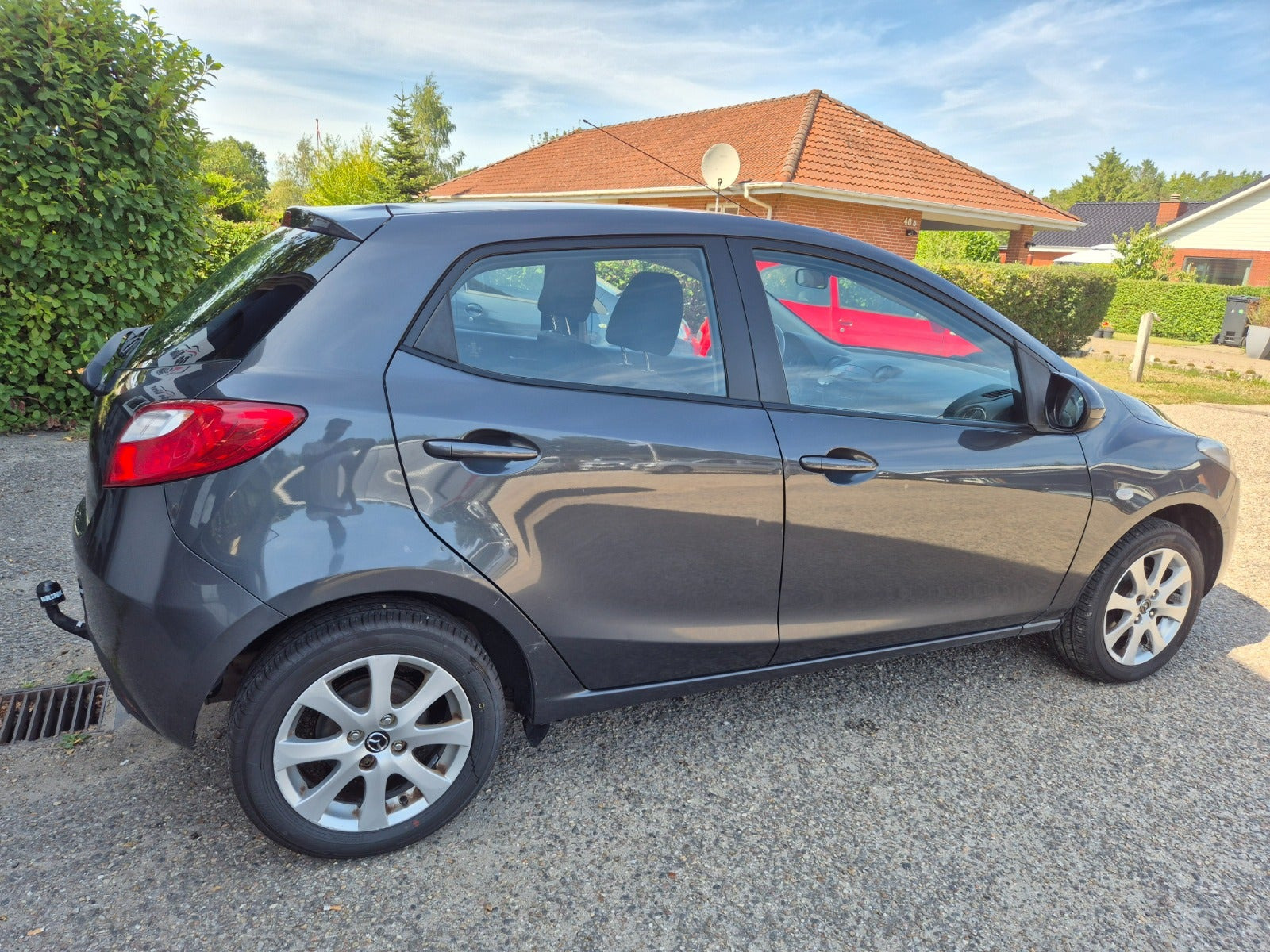 Grøn Mazda 2 fra 2012