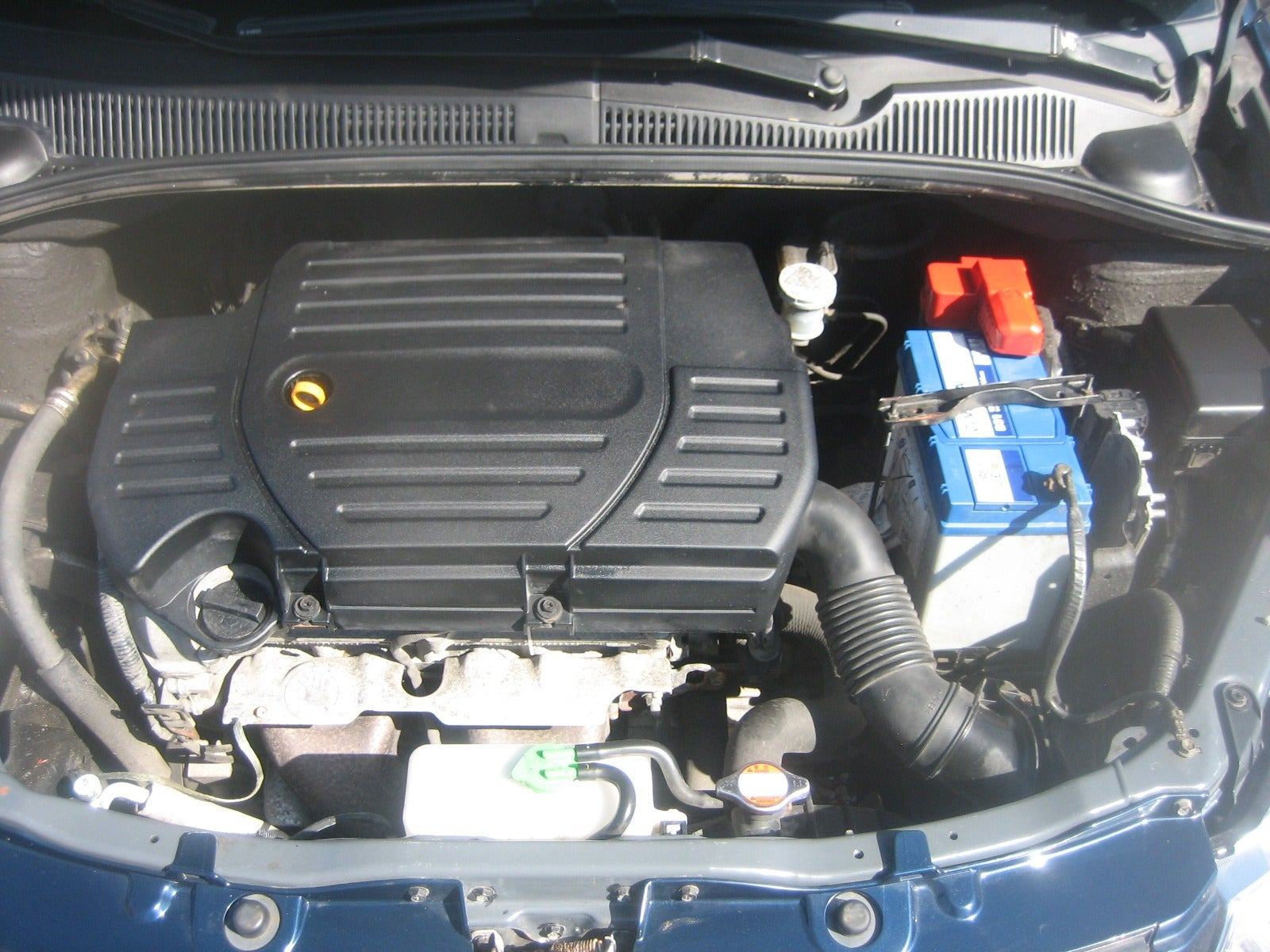 Blå Suzuki SX4 fra 2011