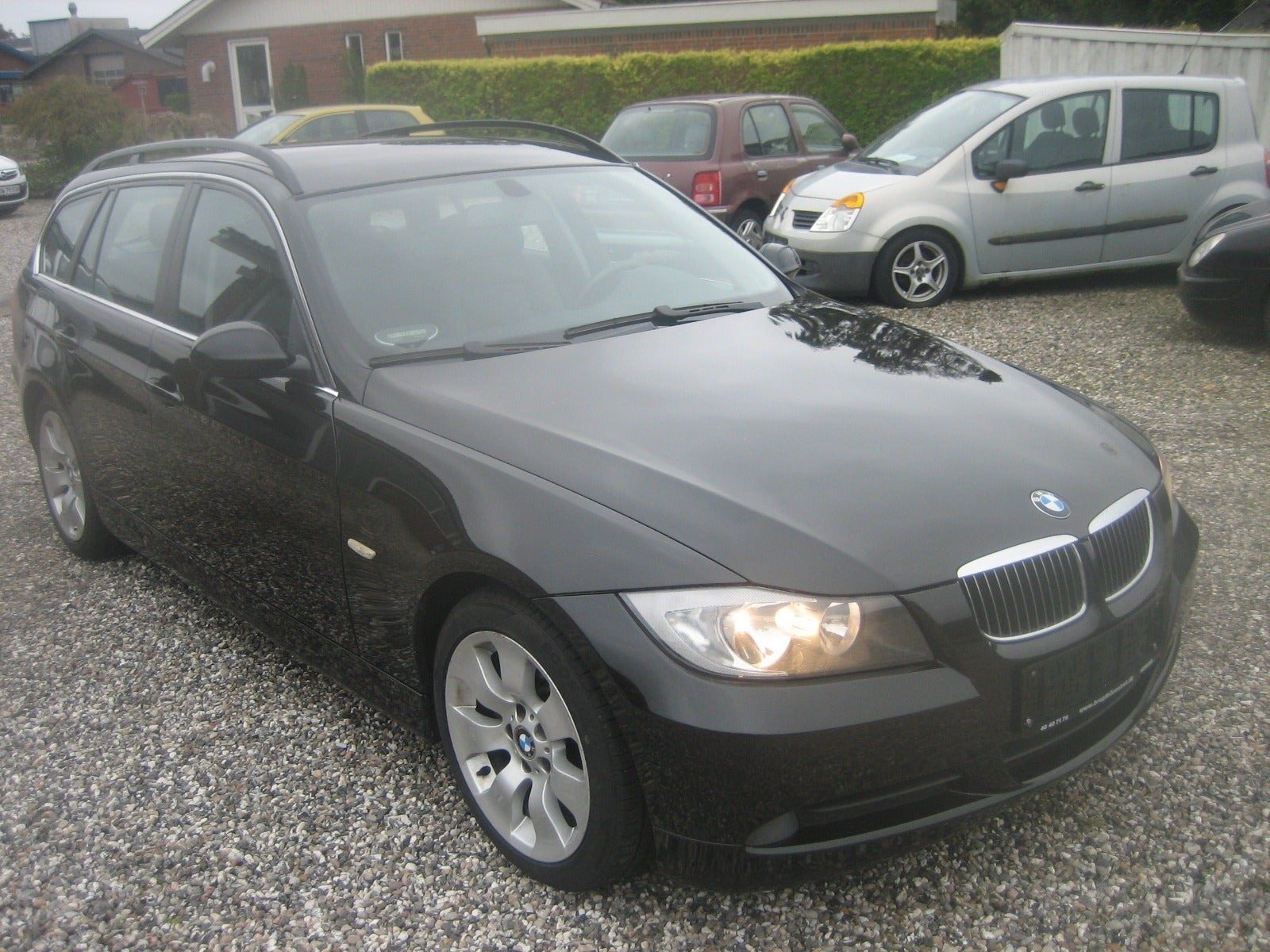 Sort BMW 325d fra 2007