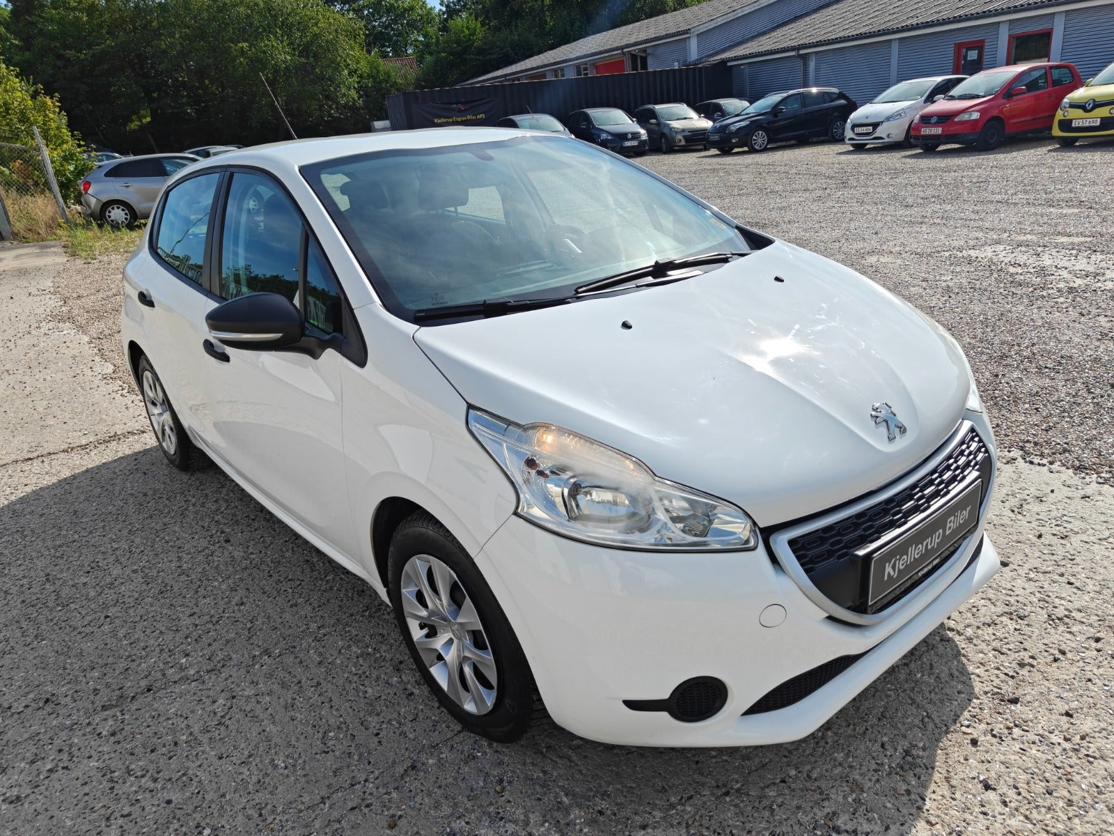 Gul Peugeot 208 fra 2014