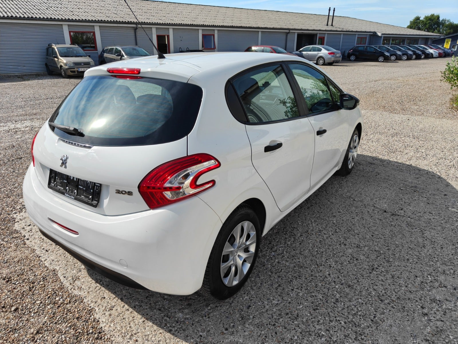 Gul Peugeot 208 fra 2014