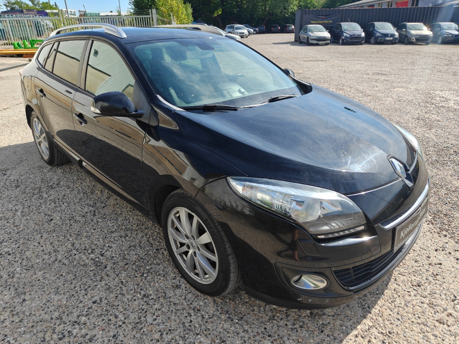 Gul Renault Megane III fra 2013